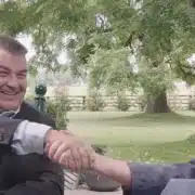 Scott Crone and Dr. Watson Share a Handshake